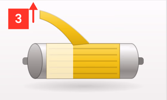 Liner being peeled away from the tape on the cylinder