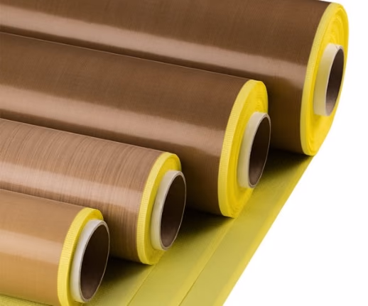 Brown PTFE cloth tape rolls with a yellow release liner