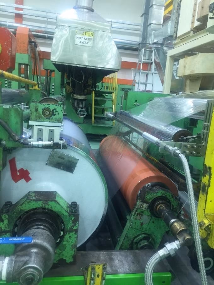 Press pressure rollers wrapped in PTFE Film Tape, the choice for rubber and silicone rubber rollers.